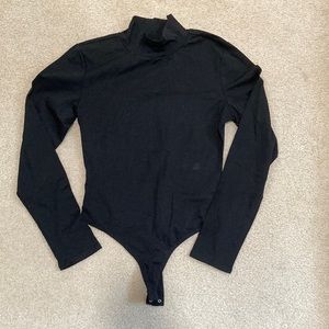 2 Black & White Long sleeve Body Suits - size L